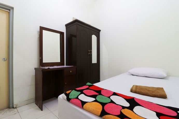 Imagen de la habitación del Casa de Huéspedes Wisma Lamida 2 Syariah. Foto 4