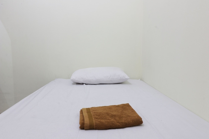 Imagen de la habitación del Casa de Huéspedes Wisma Lamida 2 Syariah. Foto 5