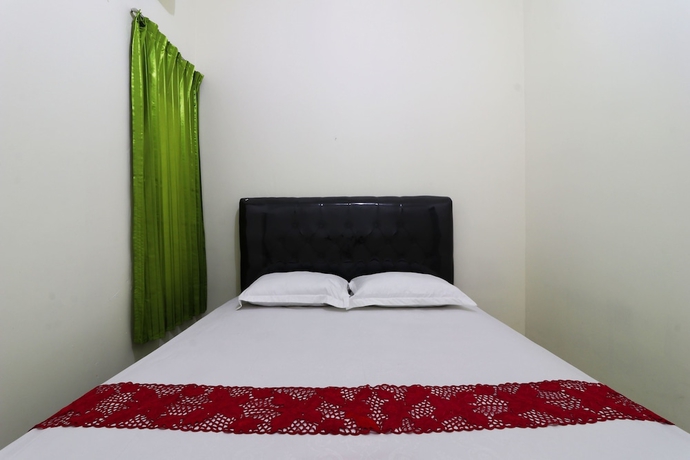 Imagen de la habitación del Casa de Huéspedes Wisma Lamida 2 Syariah. Foto 7