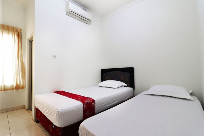 Imagen de la habitación del Casa de Huéspedes Wisma Lamida 2 Syariah. Foto 8