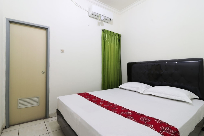 Imagen de la habitación del Casa de Huéspedes Wisma Lamida 2 Syariah. Foto 12