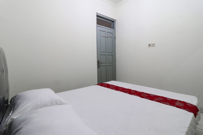Imagen de la habitación del Casa de Huéspedes Wisma Lamida 2 Syariah. Foto 14
