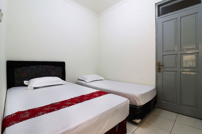 Imagen de la habitación del Casa de Huéspedes Wisma Lamida 2 Syariah. Foto 15