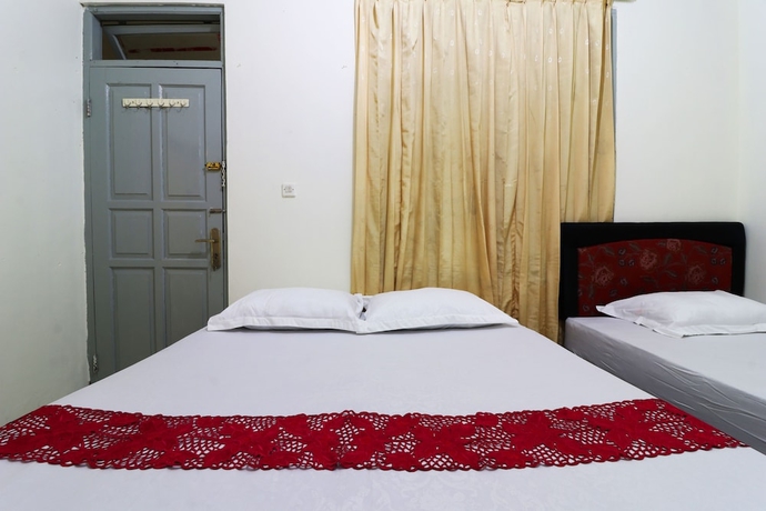 Imagen de la habitación del Casa de Huéspedes Wisma Lamida 2 Syariah. Foto 16