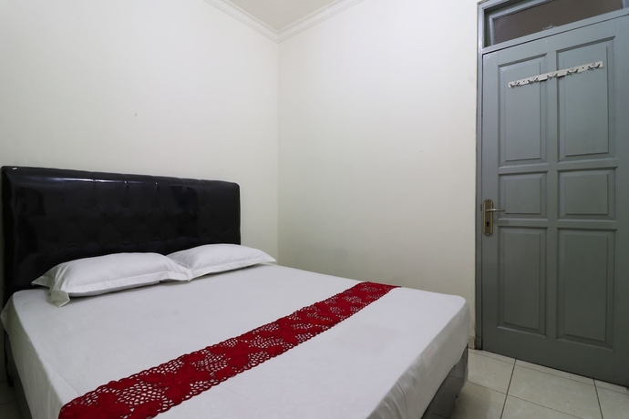 Imagen de la habitación del Casa de Huéspedes Wisma Lamida 2 Syariah. Foto 17