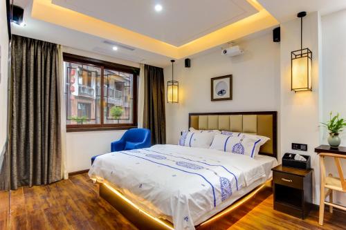 Imagen de la habitación del Casa de Huéspedes Yi Xing Ge. Foto 6