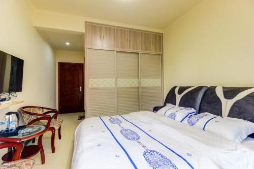 Imagen de la habitación del Casa de Huéspedes Yi Xing Ge. Foto 7