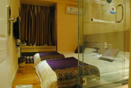 Imagen de la habitación del Casa de Huéspedes Yongyi. Foto 6