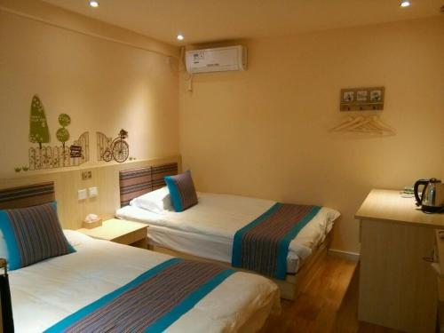 Imagen de la habitación del Casa de Huéspedes Yongyi. Foto 9