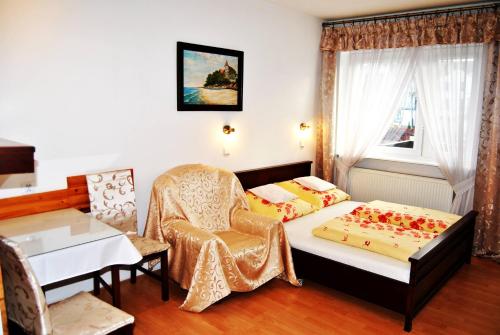 Imagen de la habitación del Casa de Huéspedes pokoje gościnne ZAWISZA. Foto 8