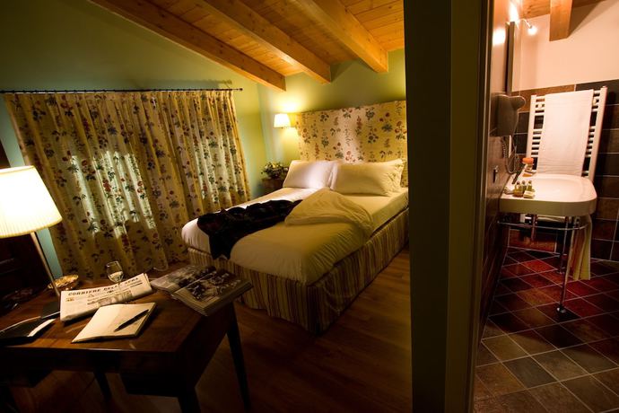 Imagen de la habitación del Finca Rústica Al Segnavento - Fioriandfrutti. Foto 11
