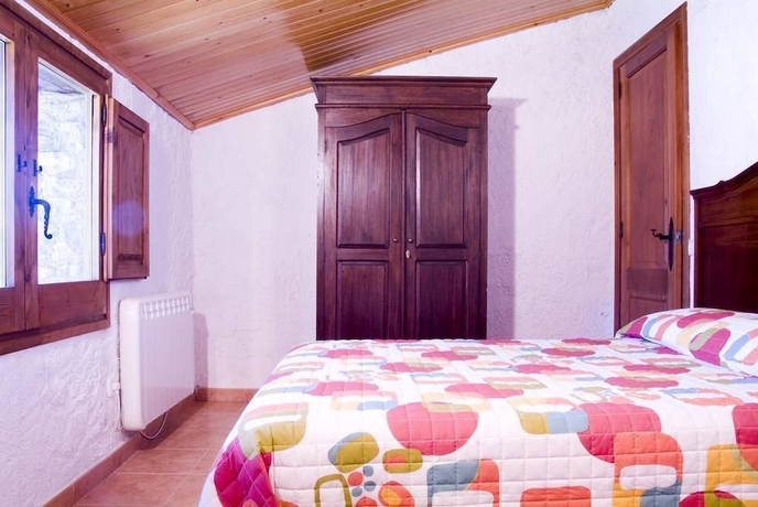Imagen de la habitación del Finca Rústica Complex Rural Can Caubet. Foto 8