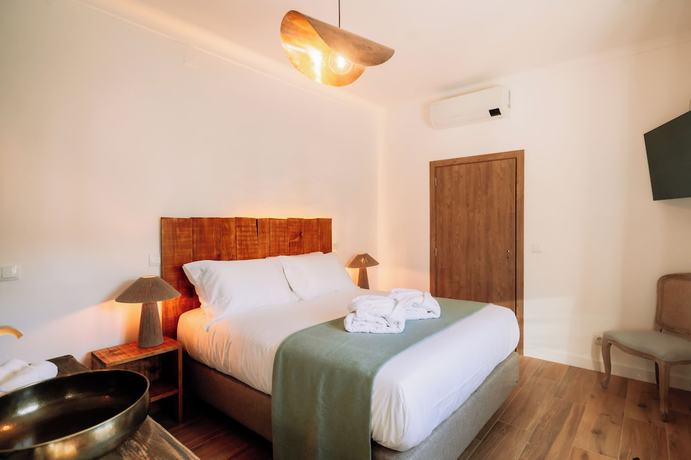 Imagen de la habitación del Finca Rústica Herdade dos Moreiros. Foto 16