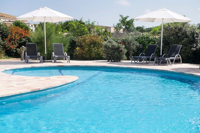 Imagen de la piscina del Finca Rústica Son Juaneda. Foto 18