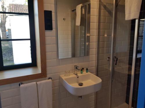 Imagen de la habitación del Hostal Alameda Rooms Santiago. Foto 2