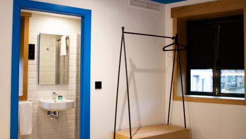 Imagen de la habitación del Hostal Alameda Rooms Santiago. Foto 4