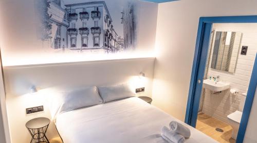 Imagen de la habitación del Hostal Alameda Rooms Santiago. Foto 7