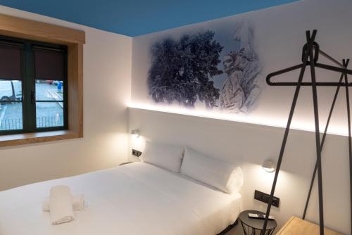 Imagen de la habitación del Hostal Alameda Rooms Santiago. Foto 8