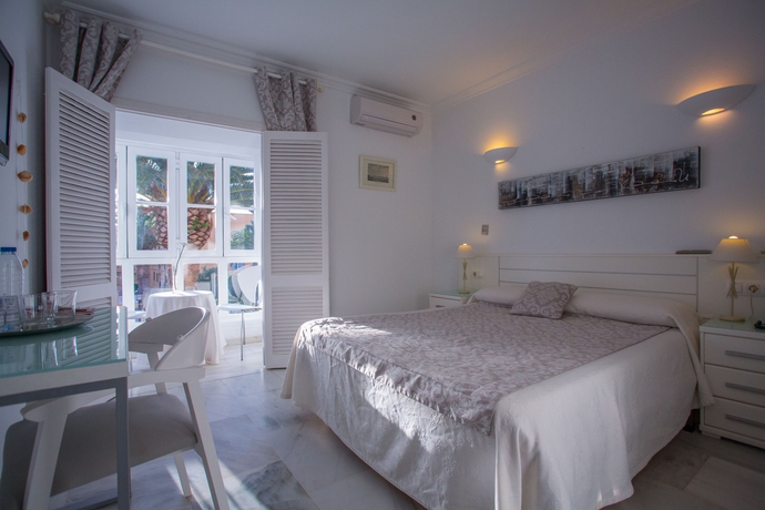 Imagen de la habitación del Hostal Alameda, Tarifa. Foto 2