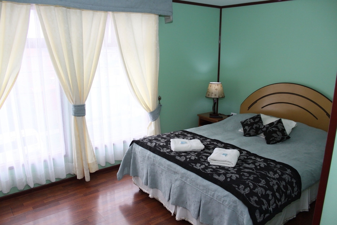 Imagen de la habitación del Hostal Alcazar, Puerto Natales. Foto 6