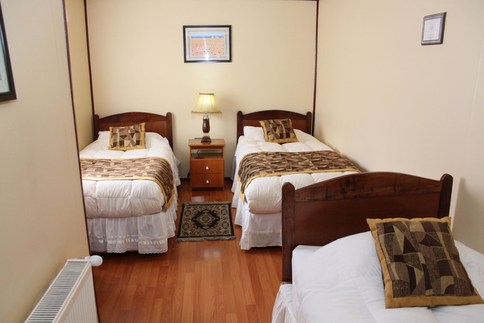 Imagen de la habitación del Hostal Alcazar, Puerto Natales. Foto 8