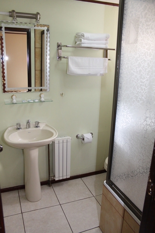 Imagen de la habitación del Hostal Alcazar, Puerto Natales. Foto 9