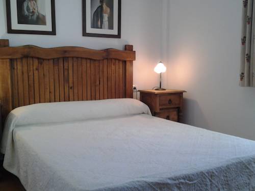 Imagen de la habitación del Hostal Apartamentos El Arco. Foto 9