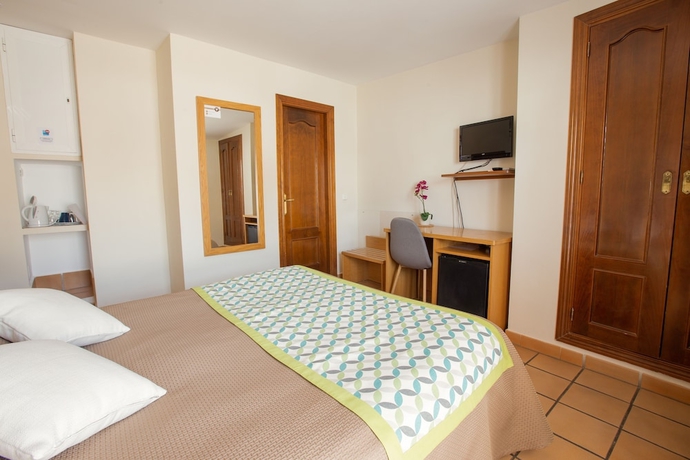 Imagen de la habitación del Hostal Apartamentos El Gallo. Foto 9