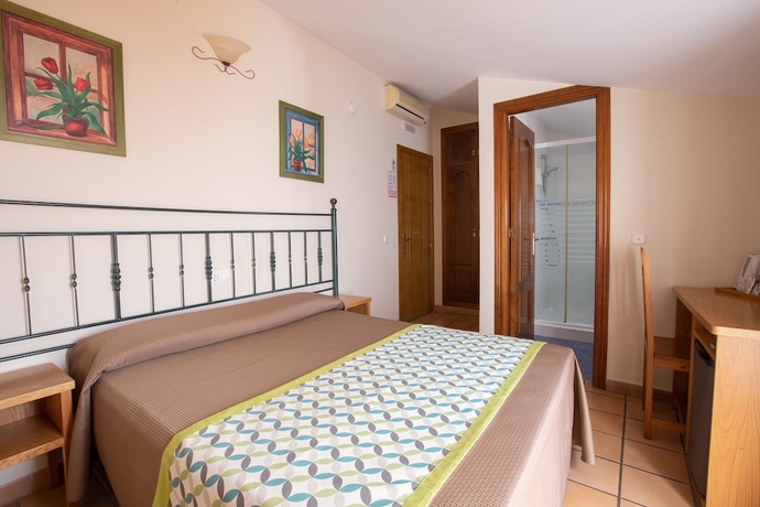 Imagen de la habitación del Hostal Apartamentos El Gallo. Foto 13