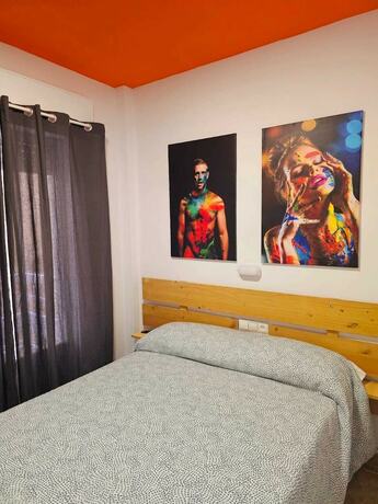 Imagen de la habitación del Hostal Arc House Granada. Foto 16
