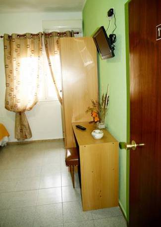 Imagen de la habitación del Hostal Asturias, Casas del Monte. Foto 3