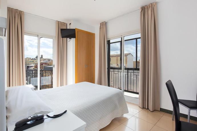 Imagen de la habitación del Hostal Atenas Granada. Foto 4