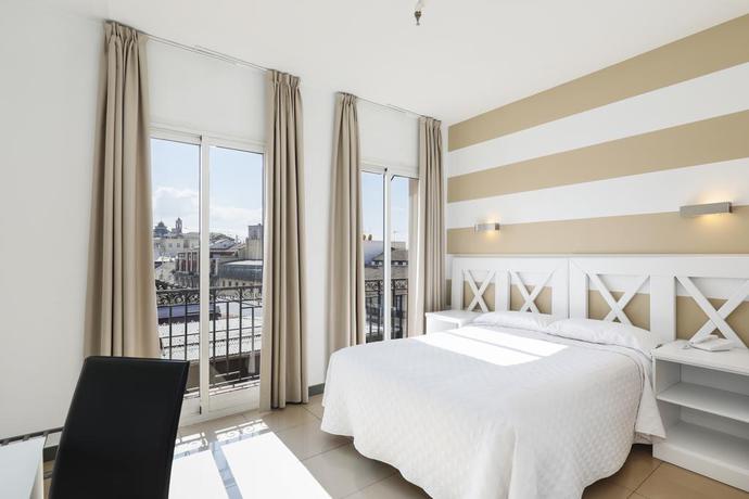 Imagen de la habitación del Hostal Atenas Granada. Foto 20