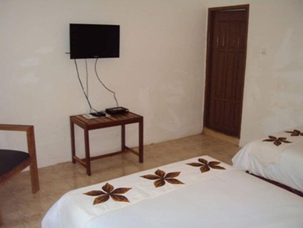 Imagen de la habitación del Hostal Banana Leaf Bungalows. Foto 5