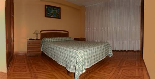 Imagen de la habitación del Hostal Baviera, Pesués. Foto 2