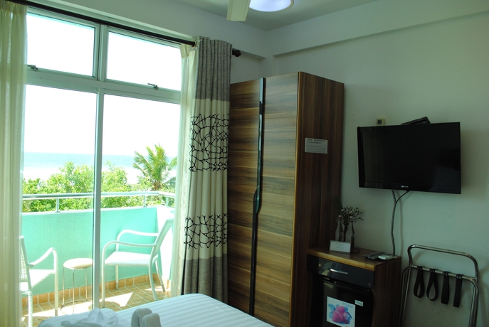 Imagen de la habitación del Hostal Beach Sunrise Inn. Foto 4
