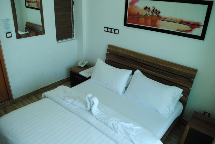 Imagen de la habitación del Hostal Beach Sunrise Inn. Foto 5