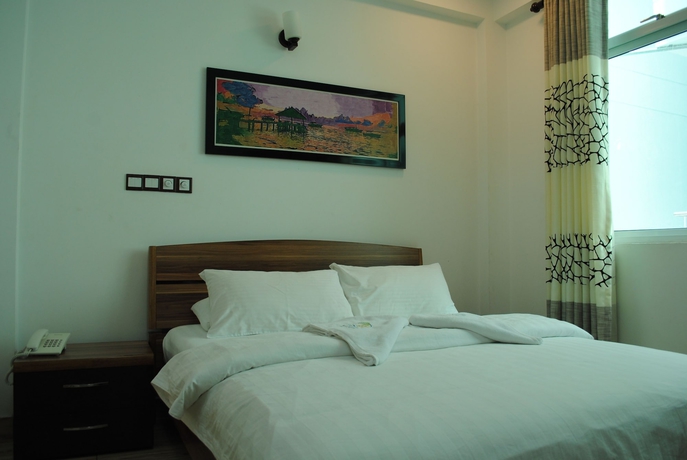 Imagen de la habitación del Hostal Beach Sunrise Inn. Foto 6