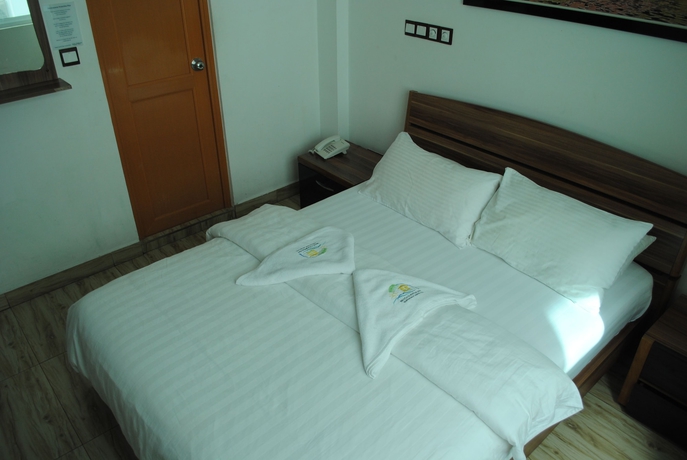 Imagen de la habitación del Hostal Beach Sunrise Inn. Foto 8