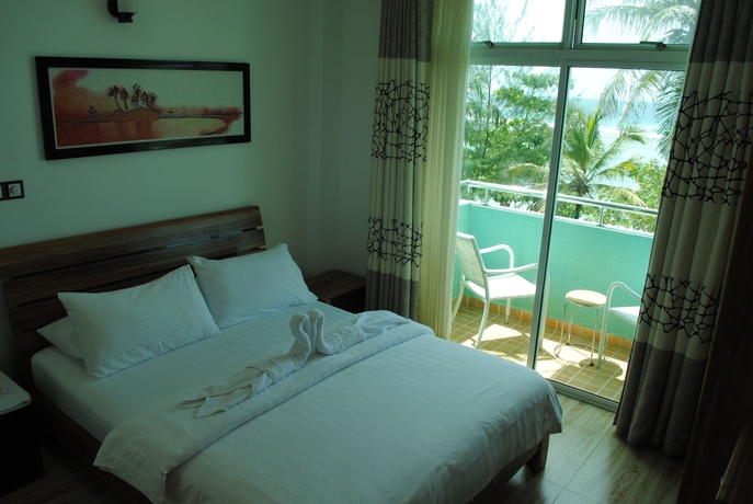 Imagen de la habitación del Hostal Beach Sunrise Inn. Foto 9