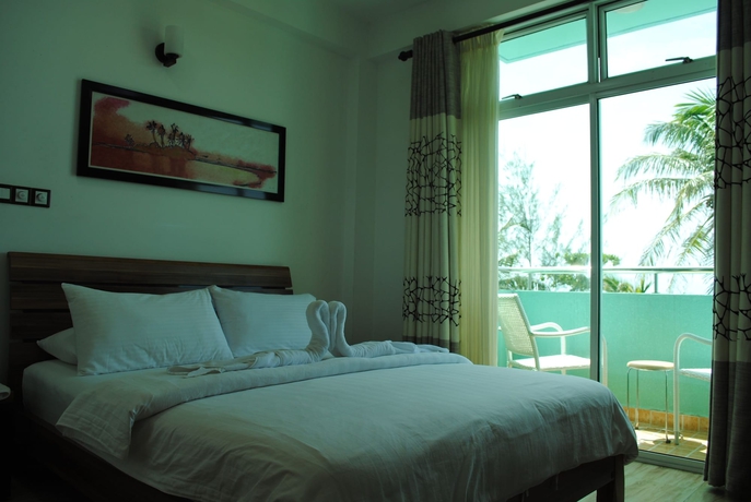 Imagen de la habitación del Hostal Beach Sunrise Inn. Foto 10