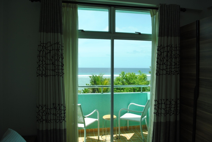 Imagen de la habitación del Hostal Beach Sunrise Inn. Foto 11