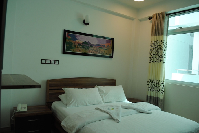 Imagen de la habitación del Hostal Beach Sunrise Inn. Foto 14