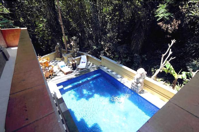 Imagen de la piscina del Hostal Bembengan Ubud Cottage. Foto 13