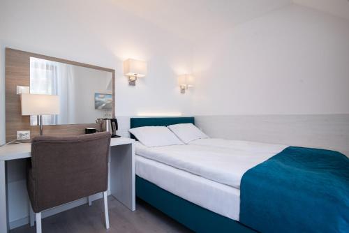 Imagen de la habitación del Hostal Błękitne Wzg&oacute;rze - Nowoczesne Pokoje Gościnne. Foto 3