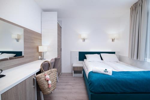 Imagen de la habitación del Hostal Błękitne Wzg&oacute;rze - Nowoczesne Pokoje Gościnne. Foto 7