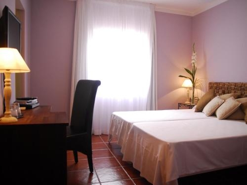 Imagen de la habitación del Hostal Boutique Salinas. Foto 7