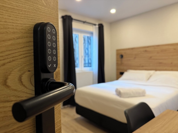 Imagen de la habitación del Hostal CC Gijon. Foto 11
