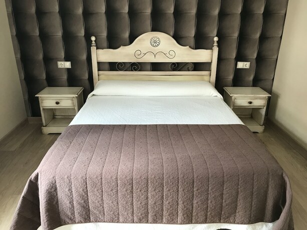 Imagen de la habitación del Hostal Cafe Gutgreco. Foto 19