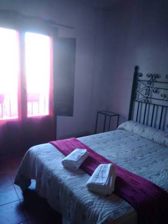 Imagen de la habitación del Hostal Calderon, Cuenca. Foto 6